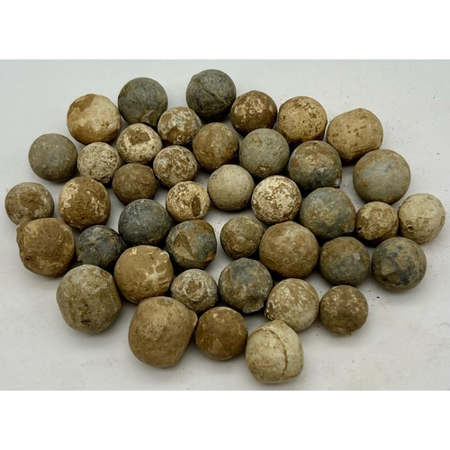 1199 - Over Twenty Antique Musket Shot Balls.