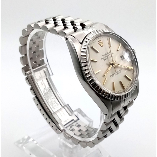 186 - A gents, stainless steel ROLEX DATEJUST watch. 36 mm dial, champagne face with gold hands and hour m... 