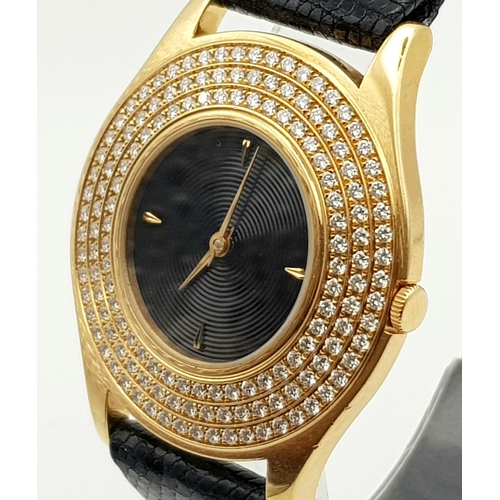 599 - A rare and collectable MAUBOUSSIN 18 K yellow gold watch with diamonds. Swiss made, 34 mm dial. blac... 