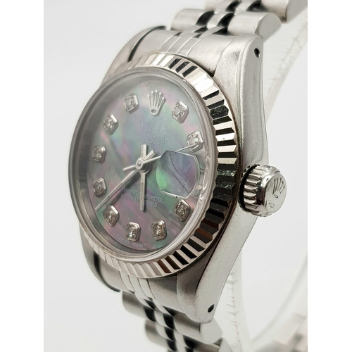 172 - A ladies, ROLEX DATEJUST watch. Stainless steel, 26 mm dial with diamonds on mother of pearl face.