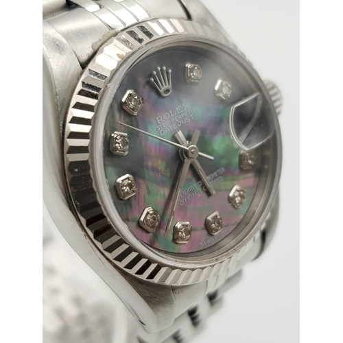 172 - A ladies, ROLEX DATEJUST watch. Stainless steel, 26 mm dial with diamonds on mother of pearl face.