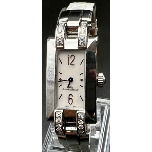 674 - A Jaeger-Le Coultre Ideale Platinum and Diamond Cased Ladies Watch. Leather strap. Platinum and diam... 