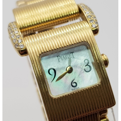 372 - A very feminine, 18 K yellow gold PIAGET watch with diamonds and Mother of pearl face. Total weight:... 