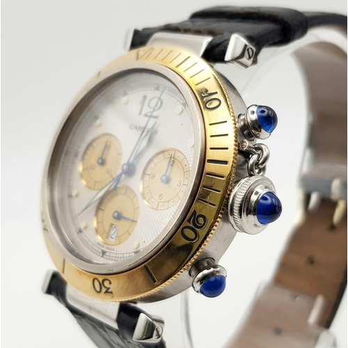 724 - A gents PASHA DE CARTIER CHRONOGRAPH watch. 38 mm dial, with gold chronometer bezel, blue sapphires ... 