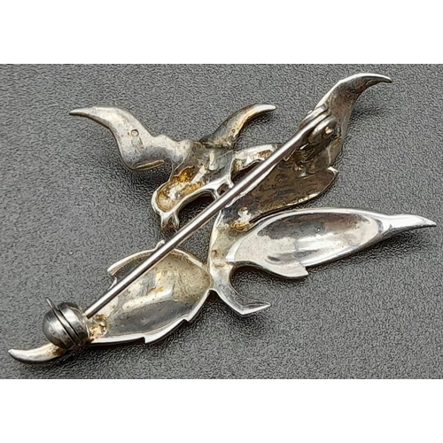 1047 - An Antique French 935 Silver and Enamel Bird and Leaf Brooch. 4.5 x 2.5cm