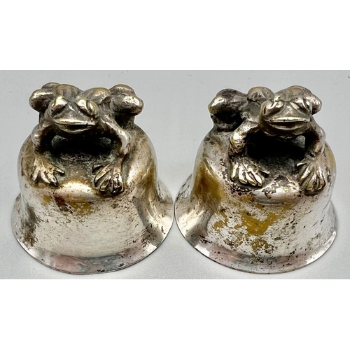 864 - An Antique Pair of Silver and Brass Miniature Stirrup Cups with Frog Decoration. 3.5cm tall. 46g tot... 