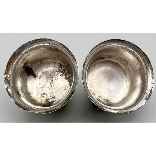 864 - An Antique Pair of Silver and Brass Miniature Stirrup Cups with Frog Decoration. 3.5cm tall. 46g tot... 