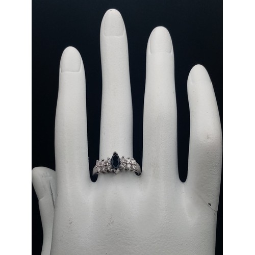 1019 - A NEW REGAL SAPPHIRE AND DIAMOND RING SET IN 14K WHITE GOLD . 3.58gms  size N