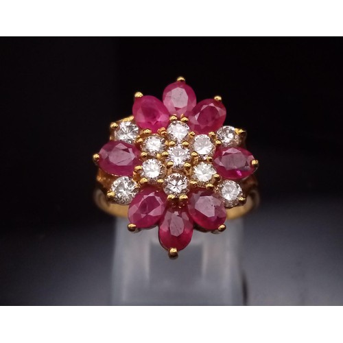 1025 - A STUNNING 18K GOLD RUBY AND DIAMOND CLUSTER RING WITH TOP QUALITY STONES.   5.3gms   size M