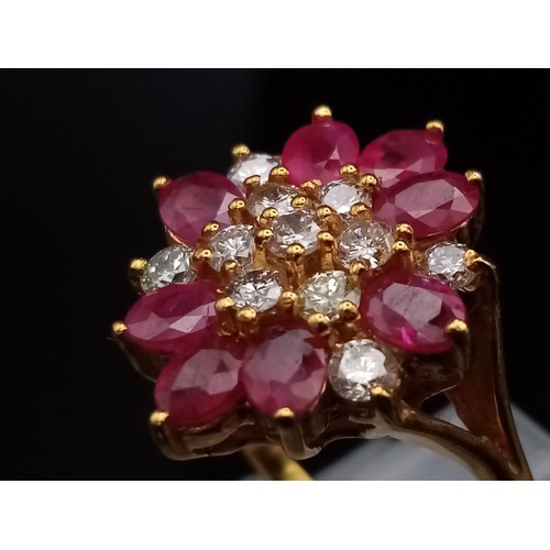 1025 - A STUNNING 18K GOLD RUBY AND DIAMOND CLUSTER RING WITH TOP QUALITY STONES.   5.3gms   size M