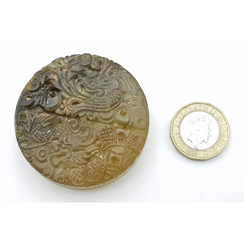 1178 - A VINTAGE NATURAL JADE CHINESE ENGRAVED MEDALLION. 72gms   5cms DIAMETER