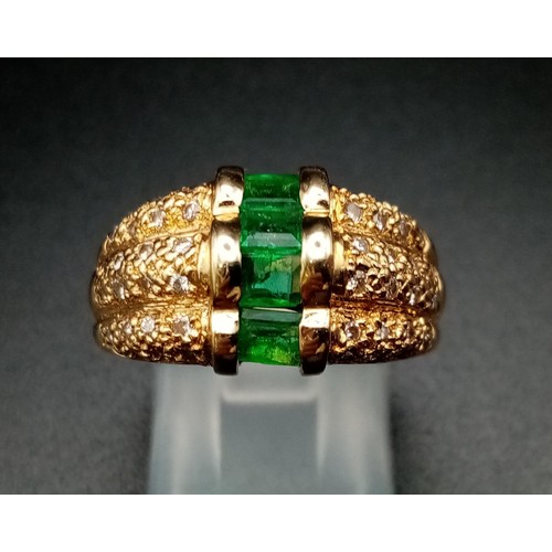 1137 - A FABULOUS 14K GOLD EMERALD AND DIAMOND RING. 9.62gms  size O