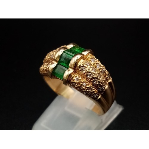 1137 - A FABULOUS 14K GOLD EMERALD AND DIAMOND RING. 9.62gms  size O