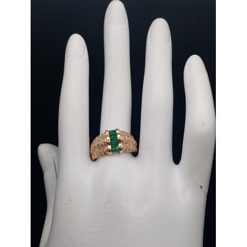 1137 - A FABULOUS 14K GOLD EMERALD AND DIAMOND RING. 9.62gms  size O