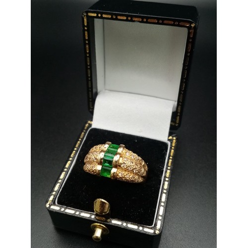 1137 - A FABULOUS 14K GOLD EMERALD AND DIAMOND RING. 9.62gms  size O