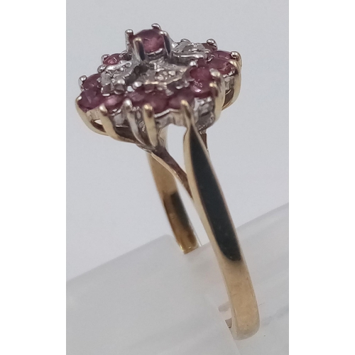 577 - A 9K Yellow Gold Diamond and Pink Tourmaline Ring. Flower design. Size K 1/2. 2.93g total weight.