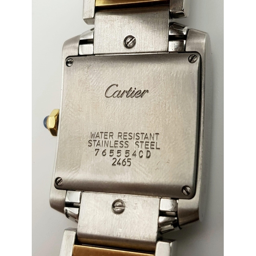 633 - A stainless steel CARTIER watch. 25 mm square dial, blue sapphire on winder, quartz movement, in exc... 