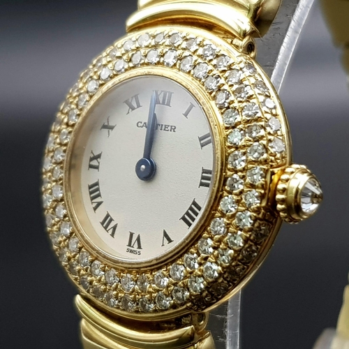 717 - Ladies CARTIER watch oozing elegance and sophistication. 18 K yellow gold, loaded with numerous bril... 