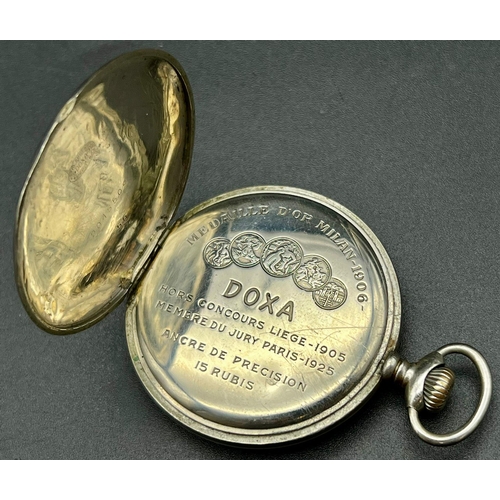 990 - An Antique Silver Doxa Pocket Watch. 5cm diameter. Sub second dial. 85.5g total weight. A/F