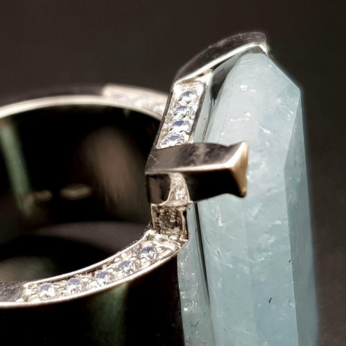 373 - A gorgeous 18 K white gold ring with a massive emerald cut aquamarine (21 x 12 x 5 mm) and diamonds ... 