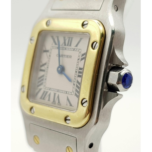 710 - A ladies, stainless steel CARTIER watch. 23 mm square dial, sapphire on winder, quartz movement. In ... 