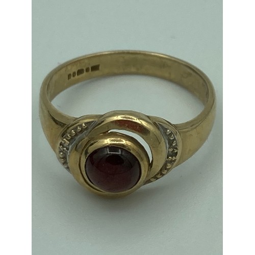 14 - 9 carat GOLD RING having GARNET CABOCHON set to top in circular Gold mount.  Full UK hallmark.
2.91 ... 