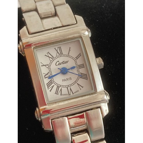 84 - Ladies wristwatch in full working order. Thought to be a facsimile. Stainless steel bracelet. Excell... 