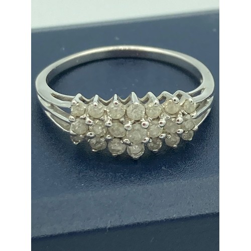 154 - 9 Carat WHITE GOLD, DIAMOND CLUSTER RING, marking inside band for  9 carat gold and the genuine gems... 