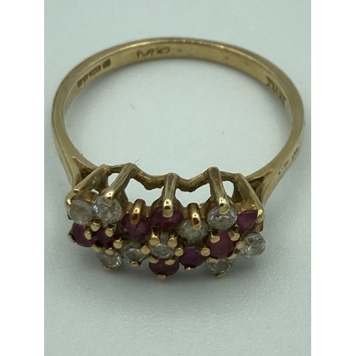 287 - Hallmarked 9 carat GOLD, RUBY and WHITE STONE RING.
 1.77 grams. Size L 1/2 - M.