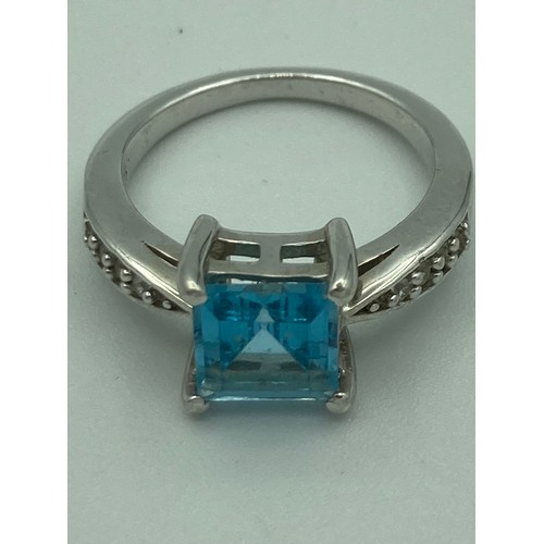 254 - SILVER and TOPAZ RING by Gemporia,having a one carat Square cut Swiss blue Topaz solitaire mounted t... 