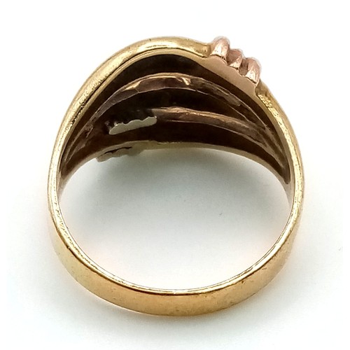 165 - A 9K Yellow, White and Rose Gold Three-Row Ring.    
Size O. 4.96g.