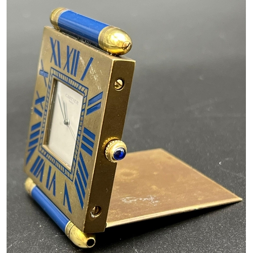 1039 - Cartier travelling alarm clock in working condition