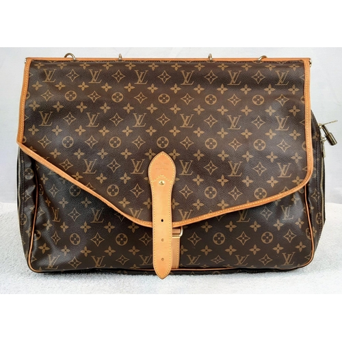 234 - A Louis Vuitton Monogram Canvas Luggage Satchel. This extra large bag has two carrying methods - han... 