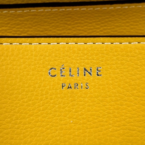 271 - A Celine of Paris Large Yellow Phantom Handbag. Bright vibrant yellow leather. External zipped pocke... 