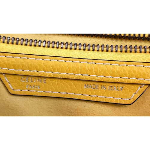 271 - A Celine of Paris Large Yellow Phantom Handbag. Bright vibrant yellow leather. External zipped pocke... 