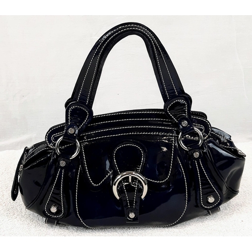 727 - Three Well-Crafted Everyday Handbags: A blue Stuart Weitzmann - 31 x 20cm. A classic black Osprey - ... 