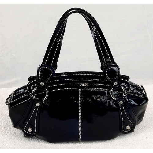 727 - Three Well-Crafted Everyday Handbags: A blue Stuart Weitzmann - 31 x 20cm. A classic black Osprey - ... 