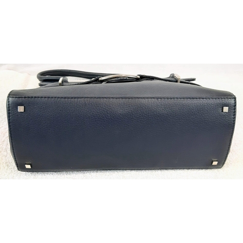 727 - Three Well-Crafted Everyday Handbags: A blue Stuart Weitzmann - 31 x 20cm. A classic black Osprey - ... 