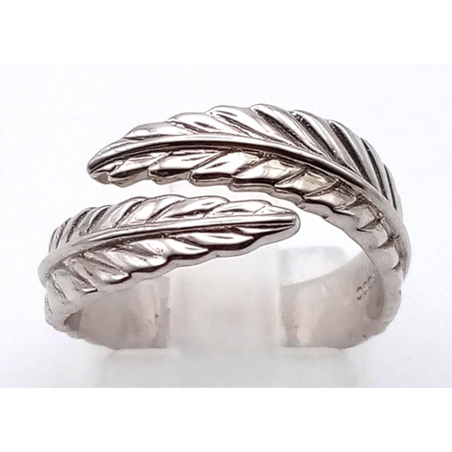 1099 - 4 LADIES SILVER FASHION RINGS.  20.3gms