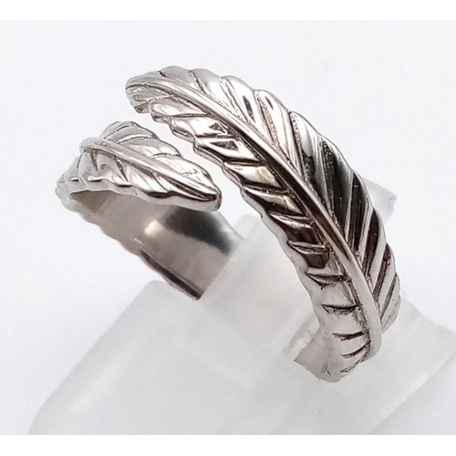 1099 - 4 LADIES SILVER FASHION RINGS.  20.3gms