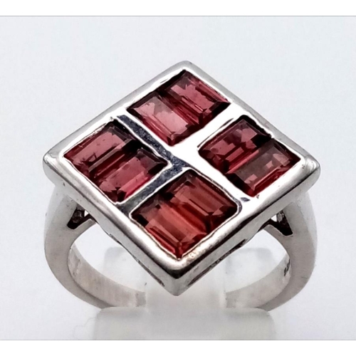 1099 - 4 LADIES SILVER FASHION RINGS.  20.3gms