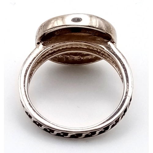 1099 - 4 LADIES SILVER FASHION RINGS.  20.3gms