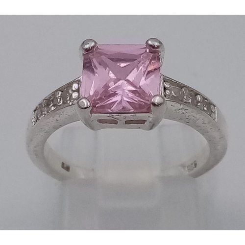 1106 - 2 BOXED SILVER RINGS WITH PINK STONE.5.7gms  size L/M