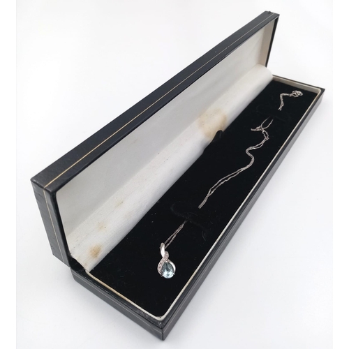 1112 - 9K WHITE GOLD AND AQUAMARINE STONE NECKLACE
1.96G  44CM LENGTH