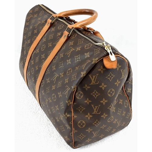 250 - A Louis Vuitton Traditional Monogrammed Canvas Keepall Badouliere 45. In good condition but please s... 