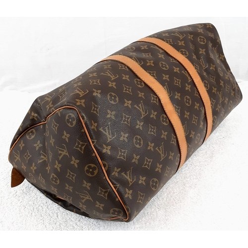 250 - A Louis Vuitton Traditional Monogrammed Canvas Keepall Badouliere 45. In good condition but please s... 