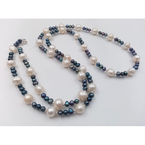 413 - A Freshwater Peacock and White Pearl Long Necklace with a 925 Silver Clasp. 90cm