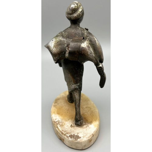 549 - An Antique Islamic Indian Hunter Figure - white metal on a marble base. 18.5 x 13.5cm.