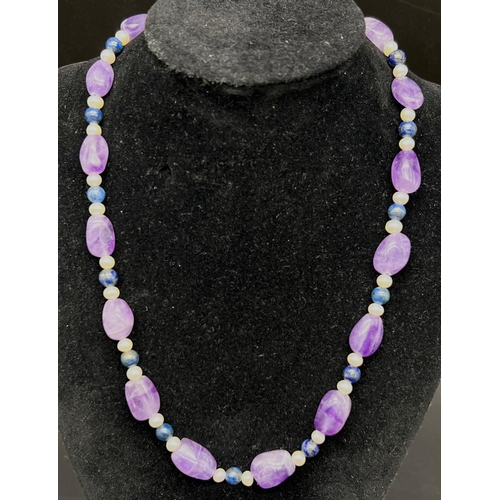 952 - A Cultured Freshwater Pearl, Amethyst and Lapis Lazuli Hand-made Necklace. 925 silver clasp. 44cm