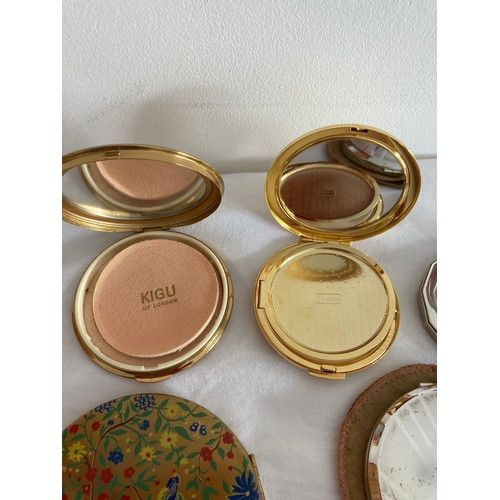 1168 - Vintage selection of compacts in various conditions some with original pouches.AF.